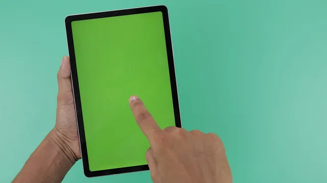 tablet, display, screen, green screen, hands, holding, finger pointing, green screen, green screen, green screen, green screen, green screen. Comparing a live product demo with a prepared sales presentation